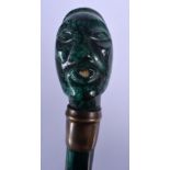 A VERY RARE 19TH CENTURY RUSSIAN CARVED MALACHITE WALKING CANE with portrait terminal and brass band