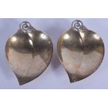 A PAIR OF TIFFANY & CO SILVER PEACH FORM DISHES. 258 grams. 15 cm wide.