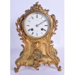 A 19TH CENTURY FRENCH BRONZE ROCOCO SCROLLING MANTEL CLOCK with acanthus mounts. 26 cm x 14 cm.