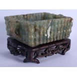 A LARGE 19TH CENTURY CHINESE CARVED FLUORITE TWIN HANDLED CENSER with floral mask head mounts. Cense