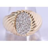 A LARGE 14CT GOLD AND DIAMOND RING. U. 13 grams.