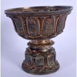 AN EARLY 20TH CENTURY CHINESE TIBETAN SILVER BUDDHISTIC STEM CUP decorated with foliage. 188 grams.