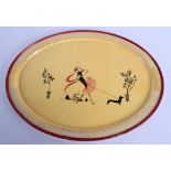 A VINTAGE PAINTED RETRO TIN PLATE OPEN WORK TRAY painted with a stylised female. 50 cm x 35 cm.