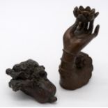 A Japanese small bronze Incense burner in the shape of a hand and a fruiting pod 7cm (2).