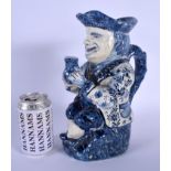 AN ANTIQUE DUTCH BLUE AND WHITE DELFT POTTERY TOBY JUG modelled as a male holding an ale jug. 27 cm