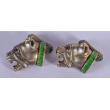 A PAIR OF CONTINENTAL SILVER GILT ENAMEL AND RUBY DOG CUFFLINKS. 29 grams. 2.5 cm x 1.5 cm.