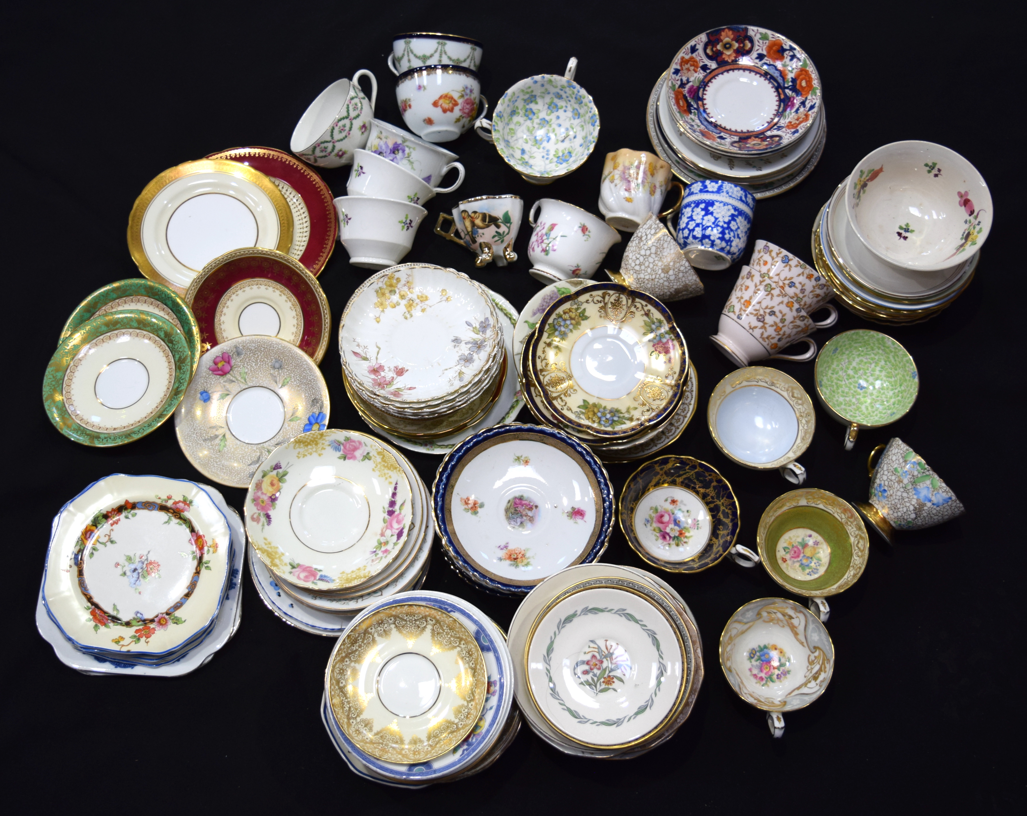 Huge collection of ceramic tea cups, saucers plates. (Qty)