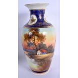 A JAPANESE NORITAKE TAISHI PERIOD PORCELAIN VASE painted with ducks within a lake. 25.5 cm high.