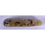 AN EARLY 20TH CENTURY CHINESE CARVED GREEN JADE BELT HOOK Late Qing/Republic. 6.25 cm wide.