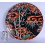 A LARGE 19TH CENTURY JAPANESE MEIJI PERIOD KUTANI IMARI CHARGER painted with scrolling coral coloure