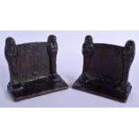 A PAIR OF ART NOUVEAU BRONZE EGYPTIAN REVIVAL BOOK ENDS formed with standing sphinxes. 15 cm x 13 cm