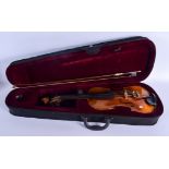 A TWO PIECE BACK VIOLIN with bow. 58 cm long. (2)