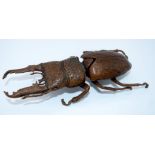 A Japanese small bronze stag beetle 13 cm .