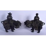 A PAIR OF 17TH/18TH CENTURY CHINESE BRONZE CENSERS AND COVERS Qing, formed as elephants roaming. 22