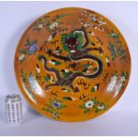 A VERY LARGE 19TH CENTURY CHINESE SANCAI GLAZED CIRCULAR PLATE Qing, bearing Kangxi marks to base, p