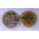 TWO EARLY 20TH CENTURY CHINESE CARVED JADE PLAQUES Late Qing. 5 cm diameter. (2)