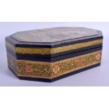 A 19TH CENTURY MIDDLE EASTERN PERSIAN QAJAR LACQUER BOX AND COVER painted with figures. 22 cm x 13 c