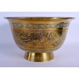 A LATE 19TH CENTURY CHINESE POLISHED BRASS BOWL bearing Xuande marks to base, decorated with birds.