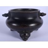 A CHINESE BRONZE CENSER 20th Century, with mask head handles. 13 cm wide, internal width 9 cm.