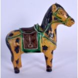 A CHINESE SANCAI PORCELAIN FIGURE OF A HORSE 20th Century. 11 cm x 13 cm.