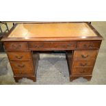 A George 111 style 8 drawer leather topped writing desk 78 x 122.