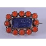 A VICTORIAN GOLD AND CORAL MOURNING BROOCH. 2.5 cm x 1.5 cm.