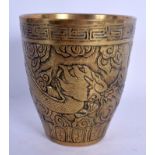 A 19TH CENTURY CHINESE BRONZE BEAKER FORM VASE Qing, decorated with dragons. 11 cm high.