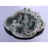 A RARE EARLY 20TH CENTURY CHINESE CARVED JADEITE BRUSH WASHER Late Qing, overlaid with a scholar and