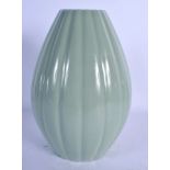 A CHINESE CELADON RIBBED VASE 20th Century, bearing Qianlong marks to base. 24 cm high.