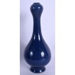 A CHINESE BLUE GLAZED VASE 20th Century. 17 cm high.