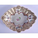 CHELSEA DERBY OVAL SHAPE DISH painted with elaborately roses, blue crown ‘D’. 31.5cm wide.