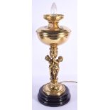 A LARGE ANTIQUE BRASS CHERUB OIL LAMP with flower lamp. 60 cm high inc shade.