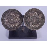 A PAIR OF EARLY MIDDLE EASTERN SILVER BUCKLES. 4.5 cm wide.