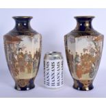 A PAIR OF 19TH CENTURY JAPANESE MEIJI PERIOD SATSUMA VASES painted with samurai and geisha within la