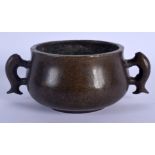 AN 18TH CENTURY CHINESE TWIN HANDLED BRONZE CENSER Qing, bearing Xuande marks to base. 1015 grams. 1