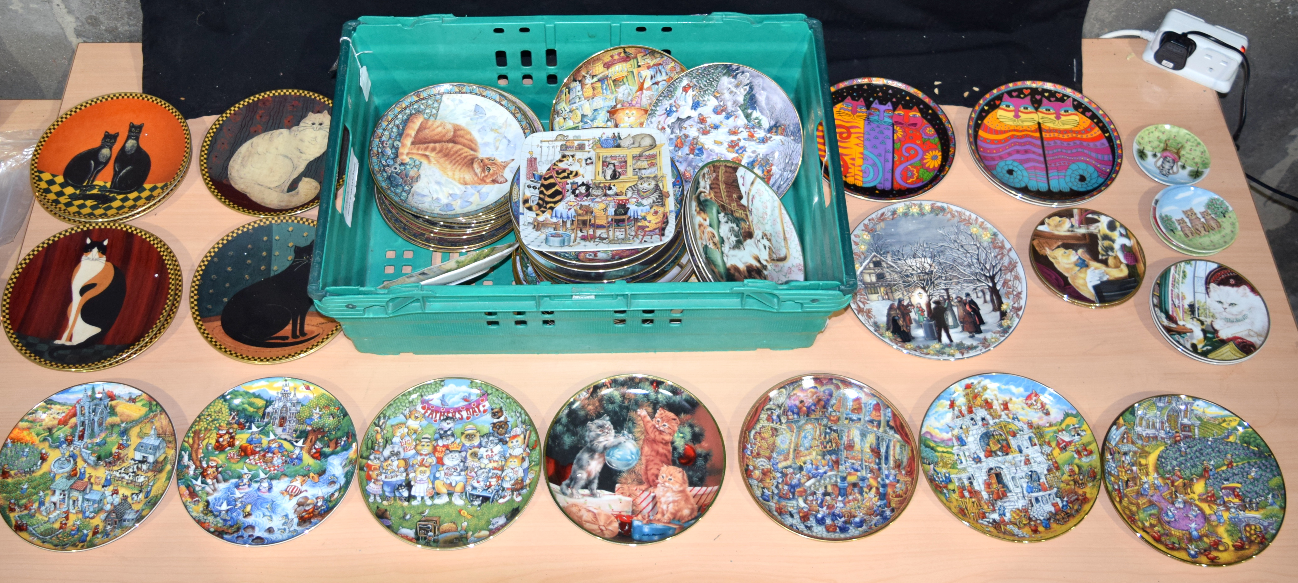 A large group of collectors plates many cat related Qty.