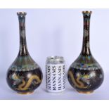 A PAIR OF 19TH CENTURY CHINESE CLOISONNE ENAMEL BULBOUS VASES Qing, decorated with dragons amongst f