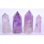 FOUR CONTINENTAL AMETHYST OBELISKS. Largest 8 cm high. (4)