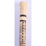 AN EARLY 19TH CENTURY EUROPEAN CARVED VERTEBRAE BONE WALKING CANE. 92 cm long.