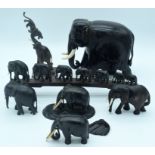 A collection of hardwood Indian and African Elephants 25 x 20cm (7).