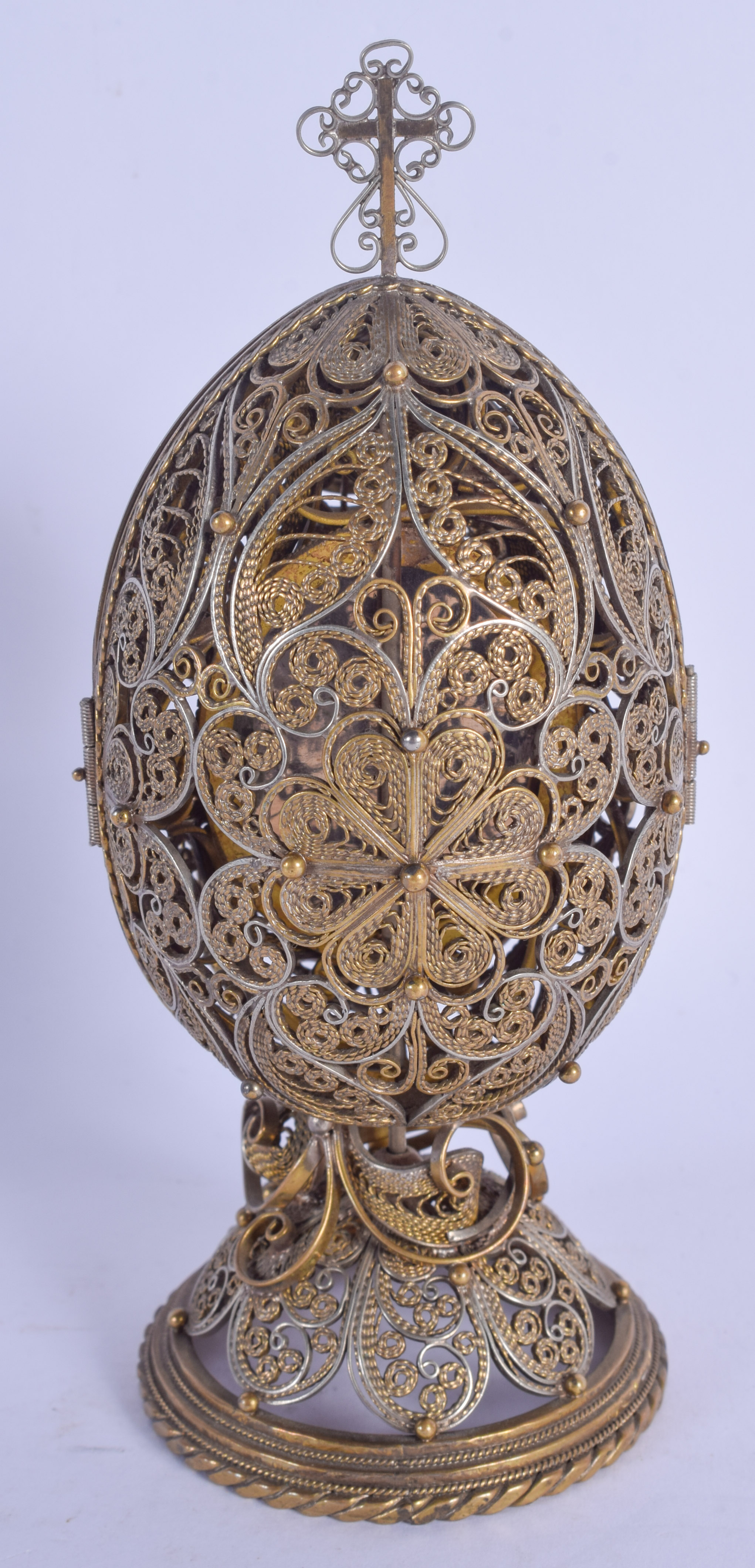 AN EARLY 20TH CENTURY RUSSIAN SILVER GILT JEWELLED EGG revealing a religious icon. 213 grams. 15 cm - Image 2 of 4