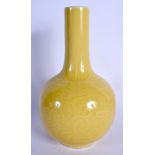 AN EARLY 20TH CENTURY CHINESE YELLOW GLAZED PORCELAIN VASE Late Qing, decorated with foliage and vin