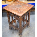 A MOORISH ISLAMIC LIBERTY TYPE HARDWOOD TABLE. 60 cm x 46 cm.