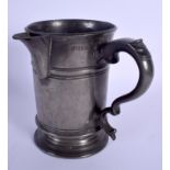 AN 18TH CENTURY PEWTER QUART JUG. 17 cm high.