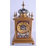 A 19TH CENTURY FRENCH BRONZE AND CHAMPLEVE ENAMEL MANTEL CLOCK retailed by Edward & sons of Paris, o