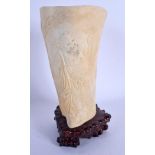 A 19TH CENTURY CHINESE CARVED BONE VASE Qing, carved with a scholar. Bone 13 cm high.