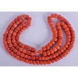 A LONG 18CT GOLD AND CORAL NECKLACE. 231 grams. 30 cm long.