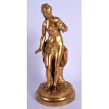 A 19TH CENTURY EUROPEAN IVORY GILT BRONZE FIGURE OF A NUDE FEMALE modelled holding a bird. 24 cm hig