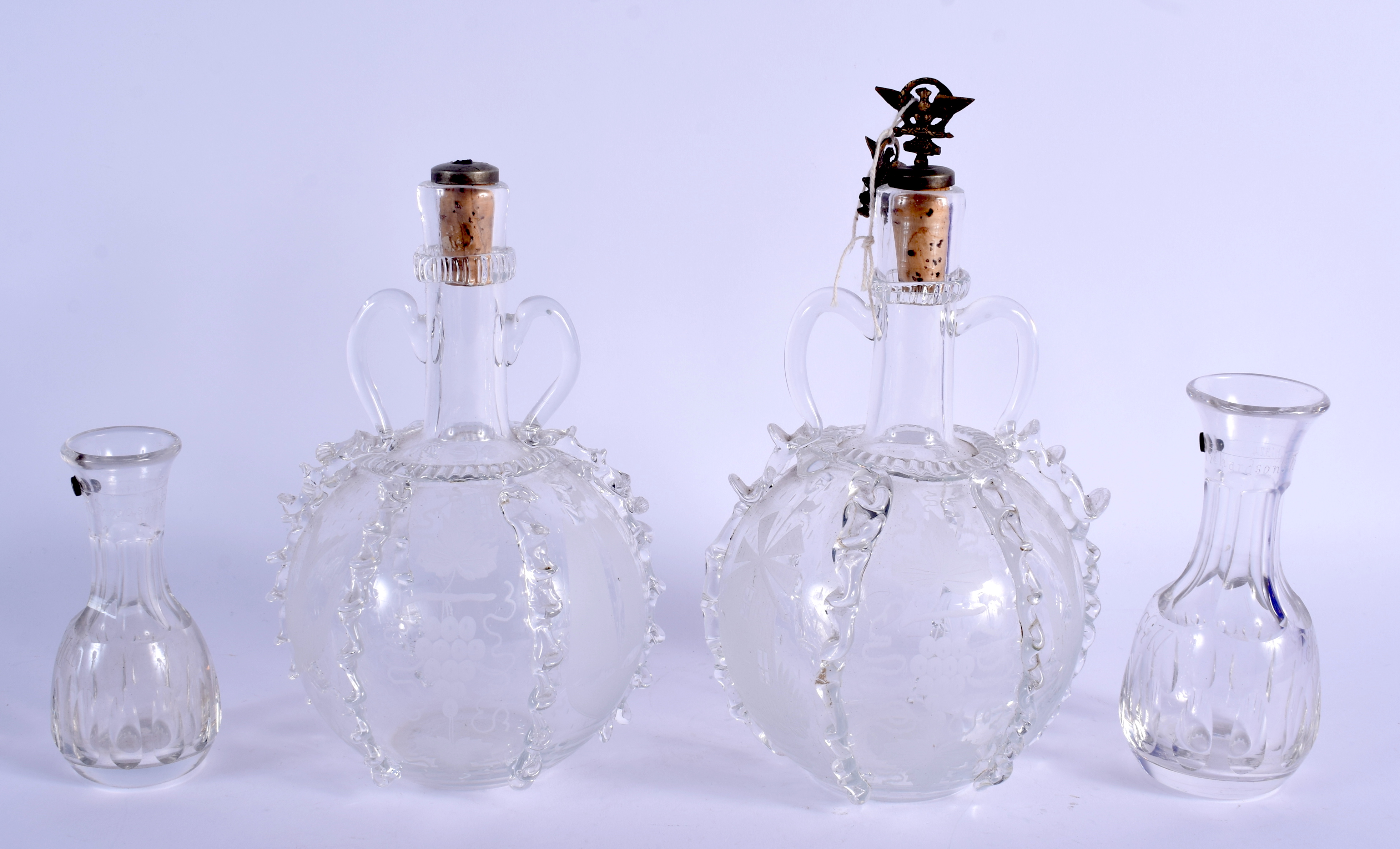 A PAIR OF 19TH CENTURY GLASS DECANTERS together with a pair of Richardson's patent ½ gill bottles. L - Image 2 of 2