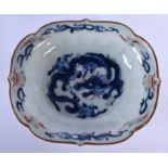 AN 18TH CENTURY JAPANESE EDO PERIOD SCALLOPED DISH painted with dragons. 15 cm wide.